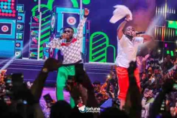 See The Price Of The Gucci Sweater & Gucci Pant Wizkid Rocks To Davido’s Concert